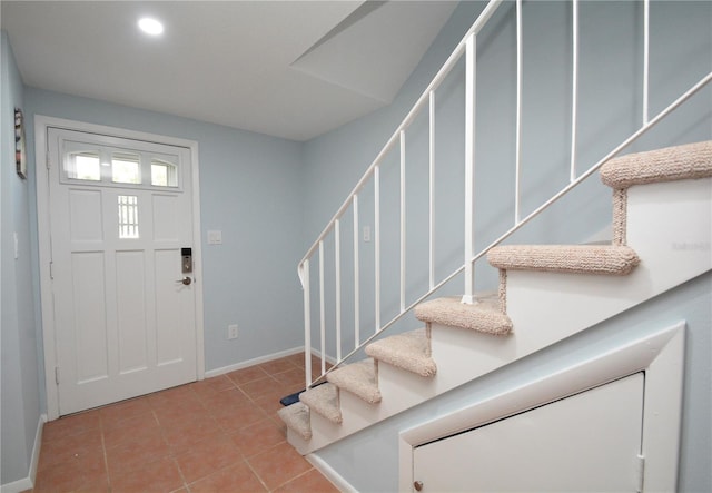 view of tiled foyer entrance