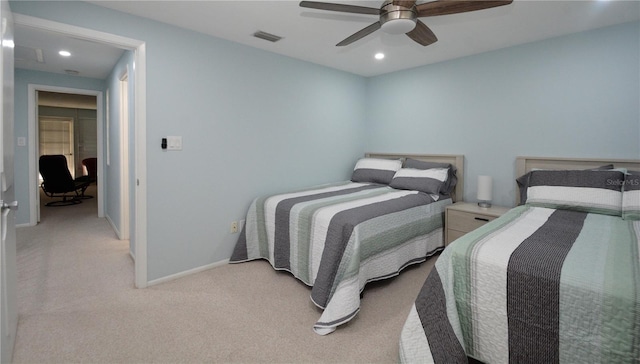 bedroom featuring ceiling fan and light colored carpet