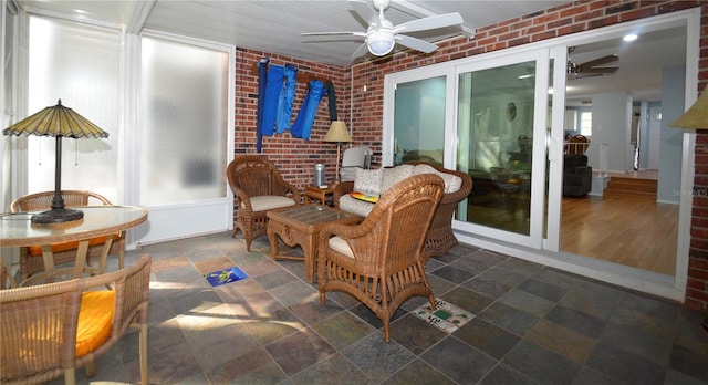 view of patio / terrace featuring ceiling fan and french doors