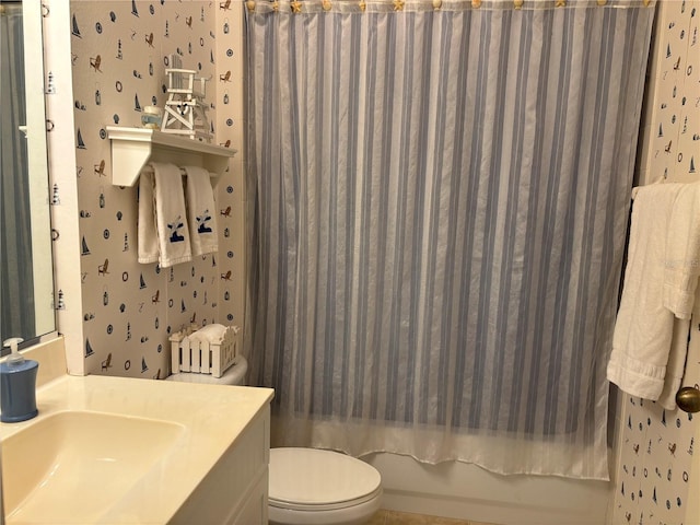 full bathroom with toilet, shower / bath combo, and vanity