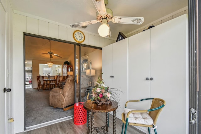 interior space featuring ceiling fan