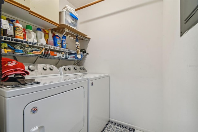 clothes washing area featuring independent washer and dryer and tile patterned flooring