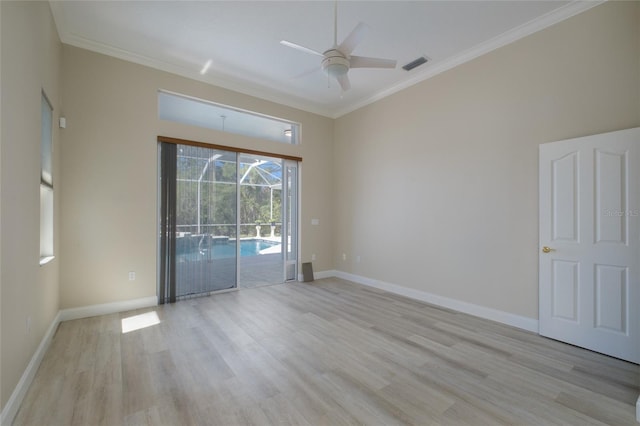 empty room featuring light hardwood / wood-style floors, ceiling fan, and ornamental molding