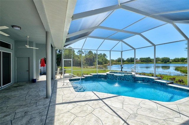 view of pool with a lanai, an in ground hot tub, a water view, and a patio