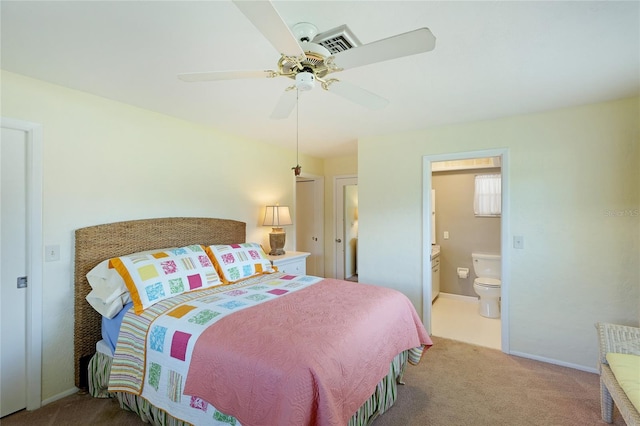 carpeted bedroom featuring ceiling fan and connected bathroom