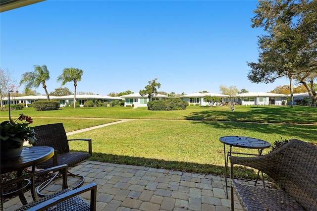 exterior space featuring a patio area and a yard