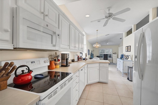 kitchen with ceiling fan, white appliances, kitchen peninsula, and white cabinetry