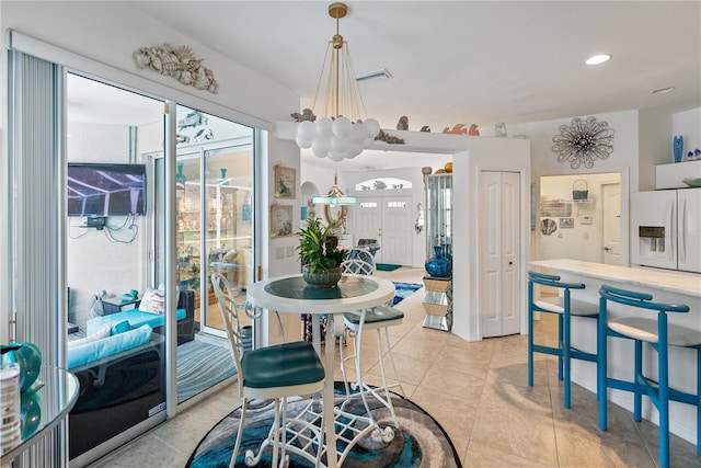 dining room with recessed lighting, visible vents, and light tile patterned floors