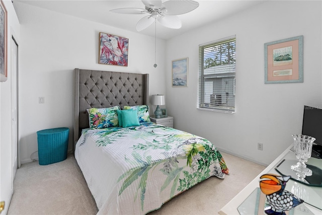 bedroom with carpet and baseboards