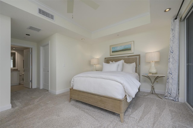 bedroom with crown molding, light colored carpet, and ceiling fan