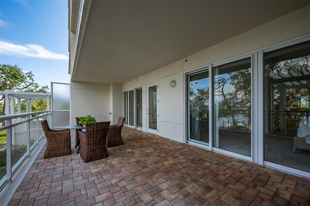 view of patio / terrace featuring a balcony