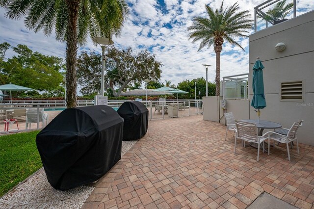 view of patio with a grill