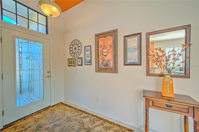 foyer entrance with a healthy amount of sunlight