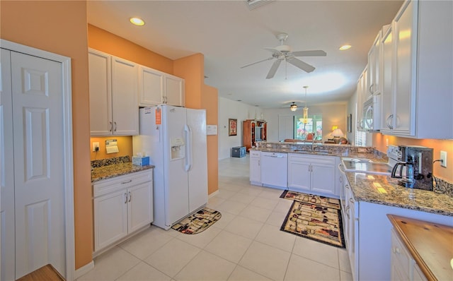 kitchen featuring light tile floors, ceiling fan, white appliances, white cabinetry, and sink