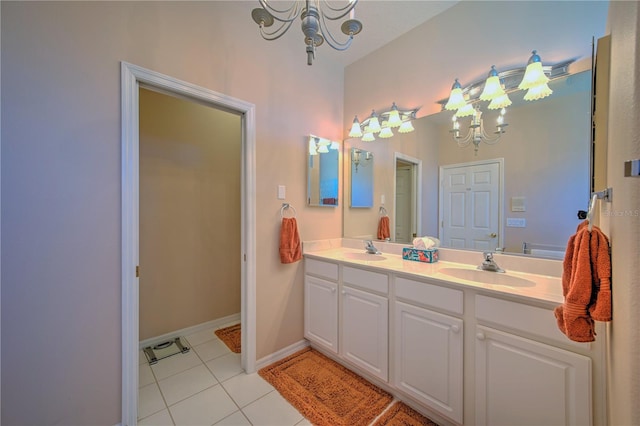 bathroom featuring double sink vanity, tile flooring, and a notable chandelier