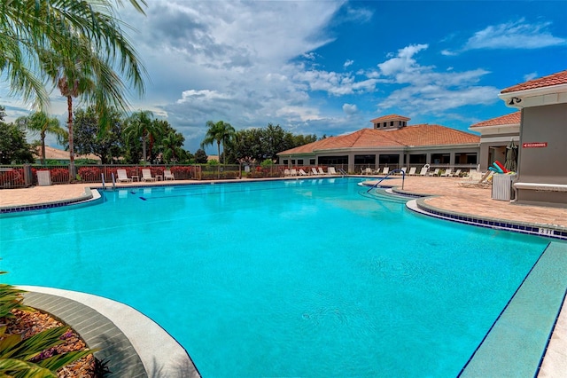 view of pool featuring a patio area