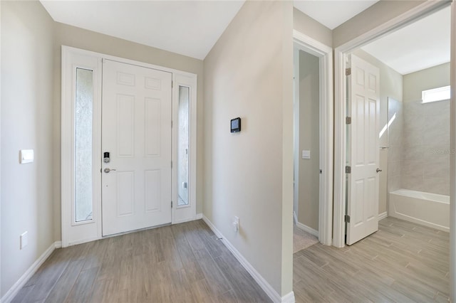 entrance foyer featuring light hardwood / wood-style flooring