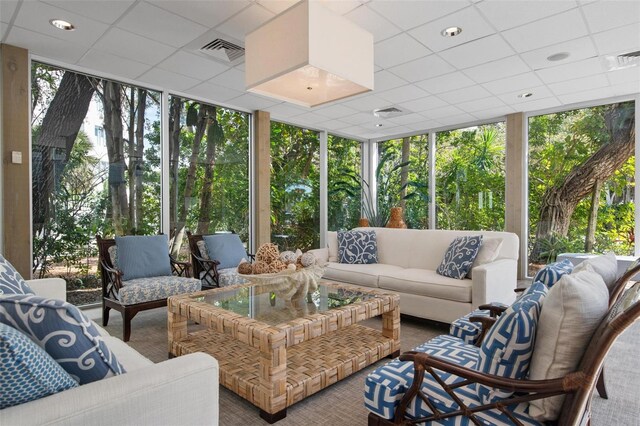 sunroom / solarium with a drop ceiling