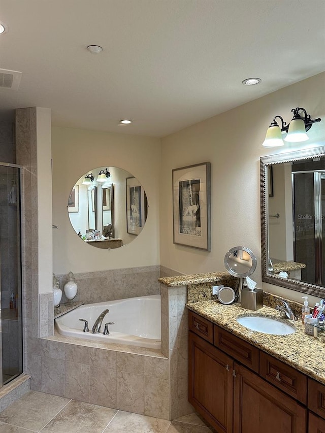full bath featuring vanity, tile patterned floors, a shower stall, a bath, and visible vents