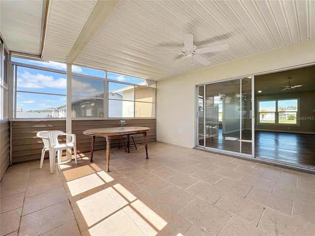 sunroom / solarium with ceiling fan