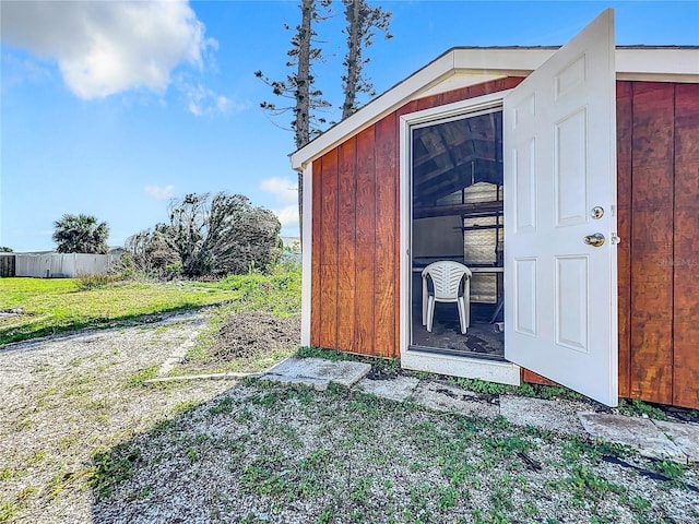 view of outdoor structure featuring a yard