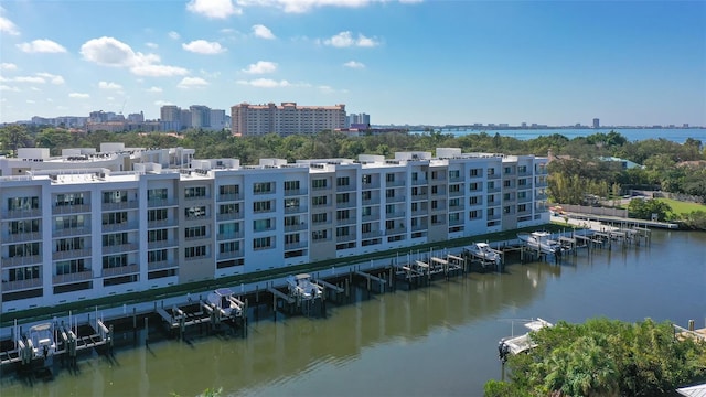 birds eye view of property featuring a water view