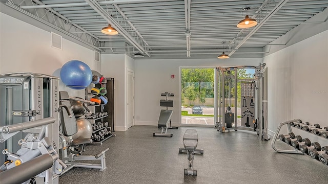 workout area with visible vents and baseboards