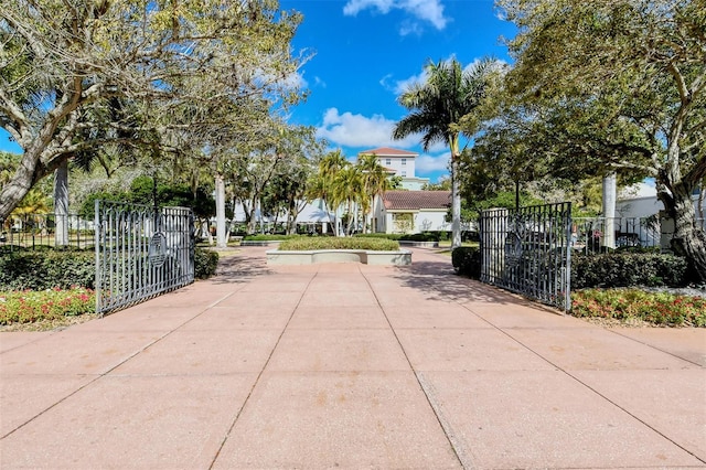 view of gate with fence