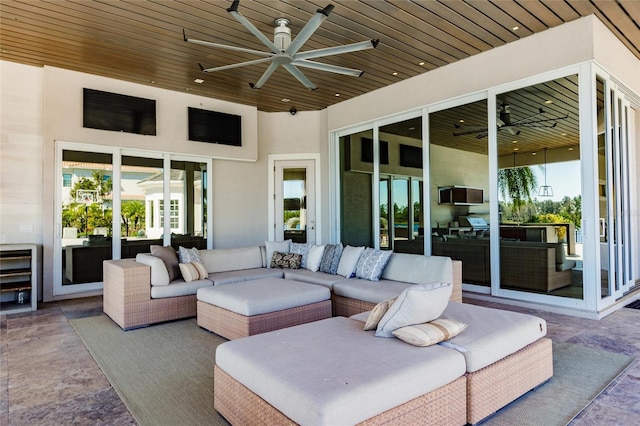 view of patio featuring outdoor lounge area and ceiling fan