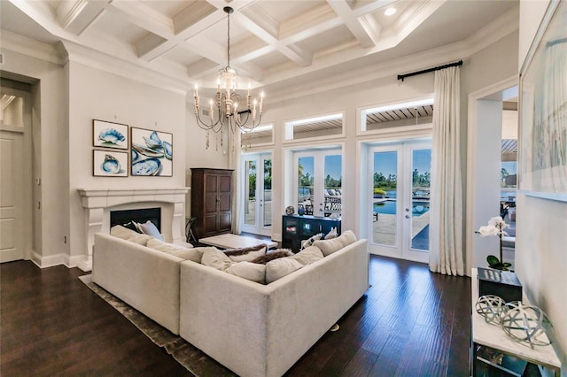 living room with french doors, coffered ceiling, crown molding, beam ceiling, and dark hardwood / wood-style floors