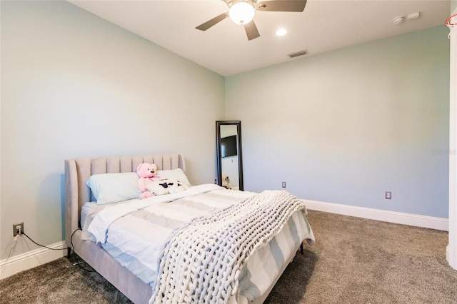 bedroom featuring dark carpet and ceiling fan