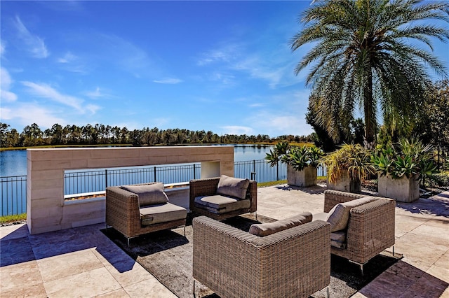 view of patio with a water view