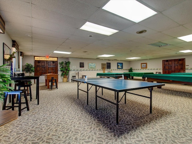 game room featuring a drop ceiling, carpet floors, and billiards