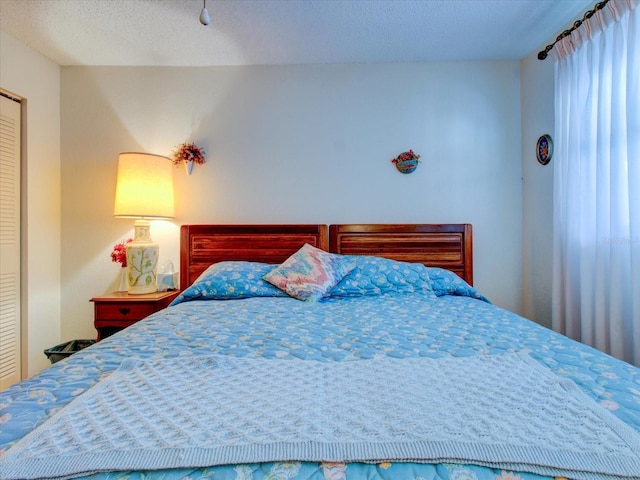 bedroom with a textured ceiling