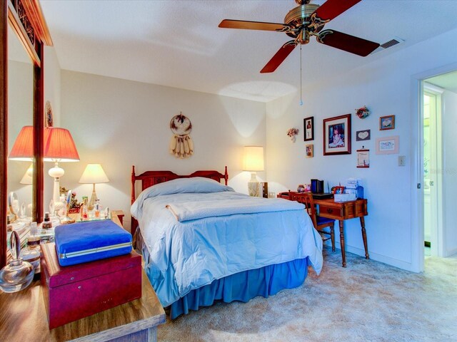 bedroom featuring carpet and ceiling fan