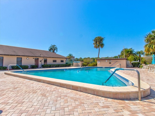 view of pool featuring a patio area