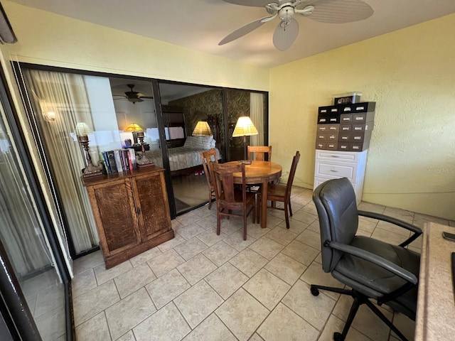 dining space featuring ceiling fan