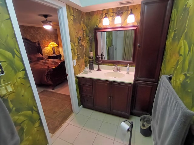 bathroom with tile patterned flooring and vanity