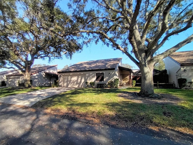 ranch-style house with a front lawn