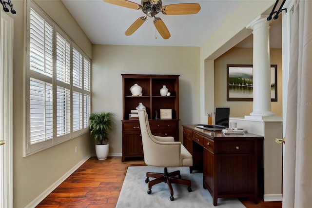 office with hardwood / wood-style floors, decorative columns, and ceiling fan