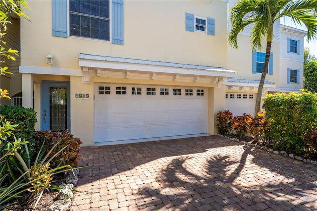 view of front of house with a garage