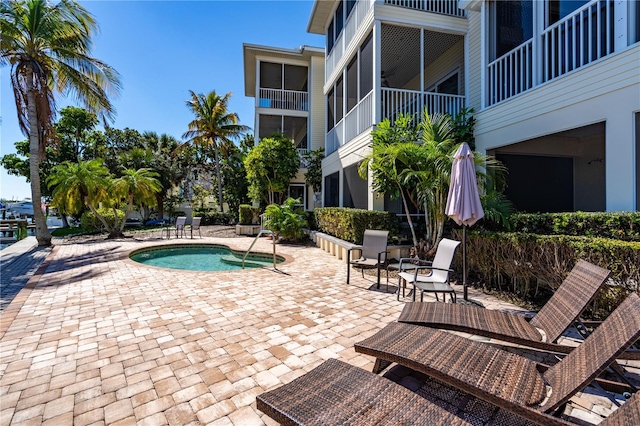 view of swimming pool featuring a patio