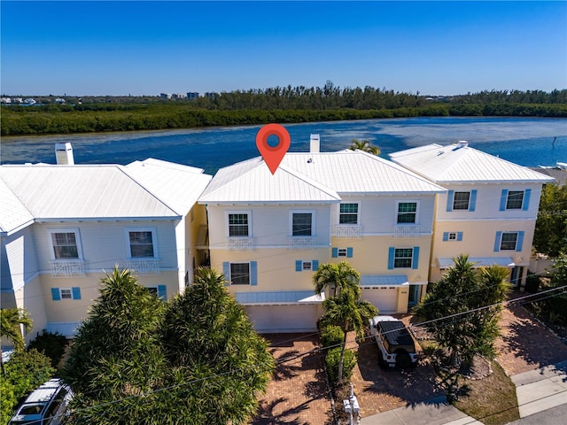 bird's eye view with a water view