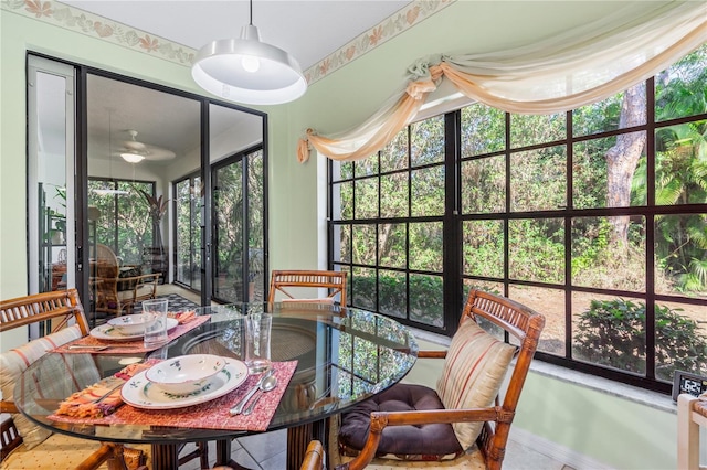 sunroom / solarium featuring plenty of natural light