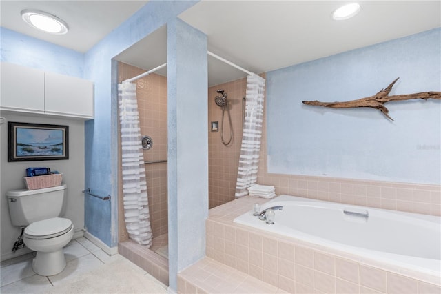 bathroom featuring toilet, tile floors, and independent shower and bath