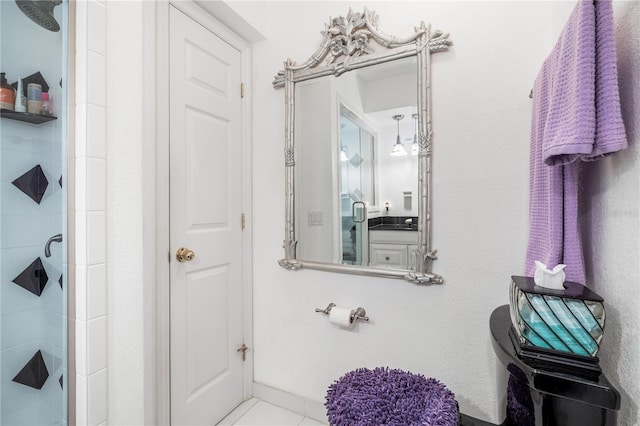 bathroom with vanity and tile floors