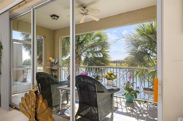 balcony featuring ceiling fan