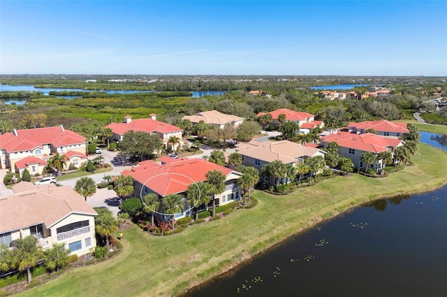 drone / aerial view with a water view