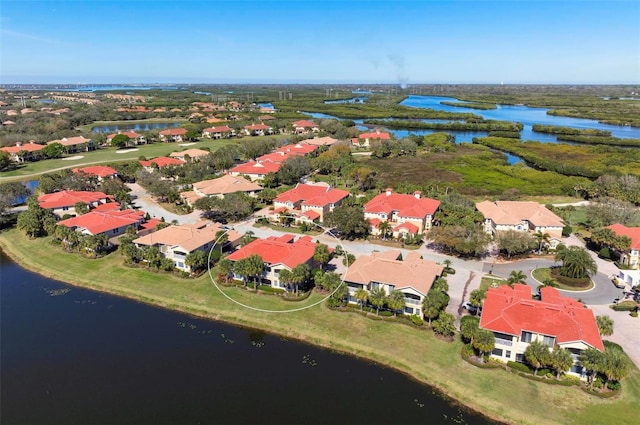 drone / aerial view with a water view