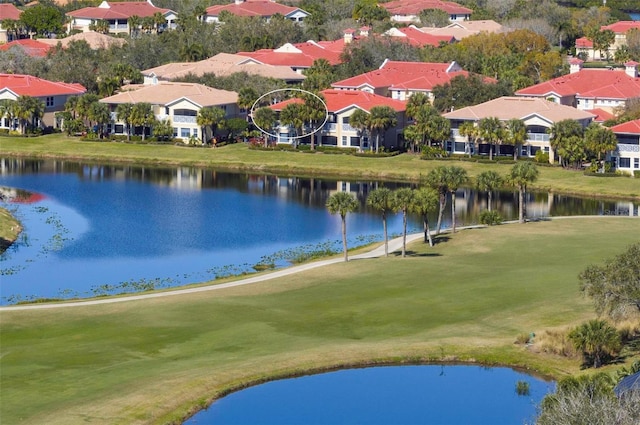 drone / aerial view featuring a water view